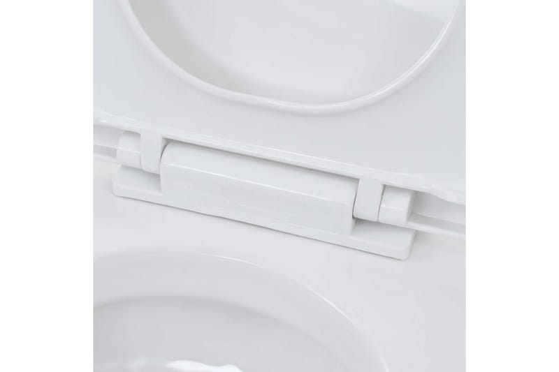 Vegghengt toalett med skjult sisterne keramikk - Hvit - Hus & oppussing - Kjøkken & bad - Baderom - Toaletter - Vegghengt