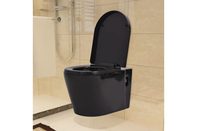 Vegghengt toalett med skjult sisterne svart keramikk - Hus & oppussing - Kjøkken & bad - Baderom - Toaletter - Vegghengt
